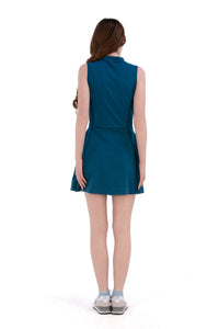 Woman wearing a Blue Opal dress on a white background