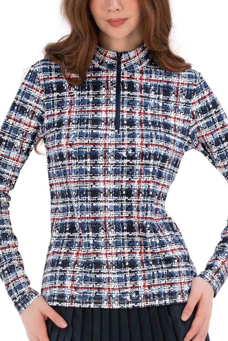 Woman wearing a Red White Blue Plaid shirt and navy pleated skirt on a white background