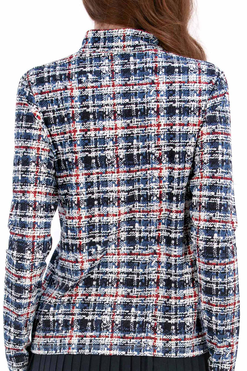 Woman wearing a Red White Blue Plaid shirt and navy pleated skirt on a white background